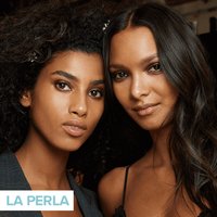 two people looking into camera and posing
