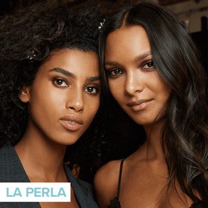 two people looking into camera and posing