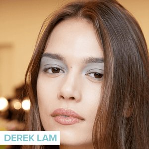 person wearing metallic eye makeup