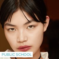 person wearing berry colored lipstick