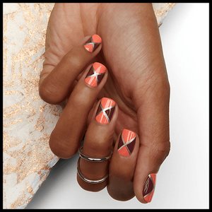 hand with nails painted with nail art