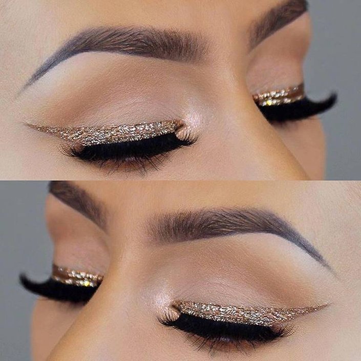 person wearing gold glitter liquid eyeliner