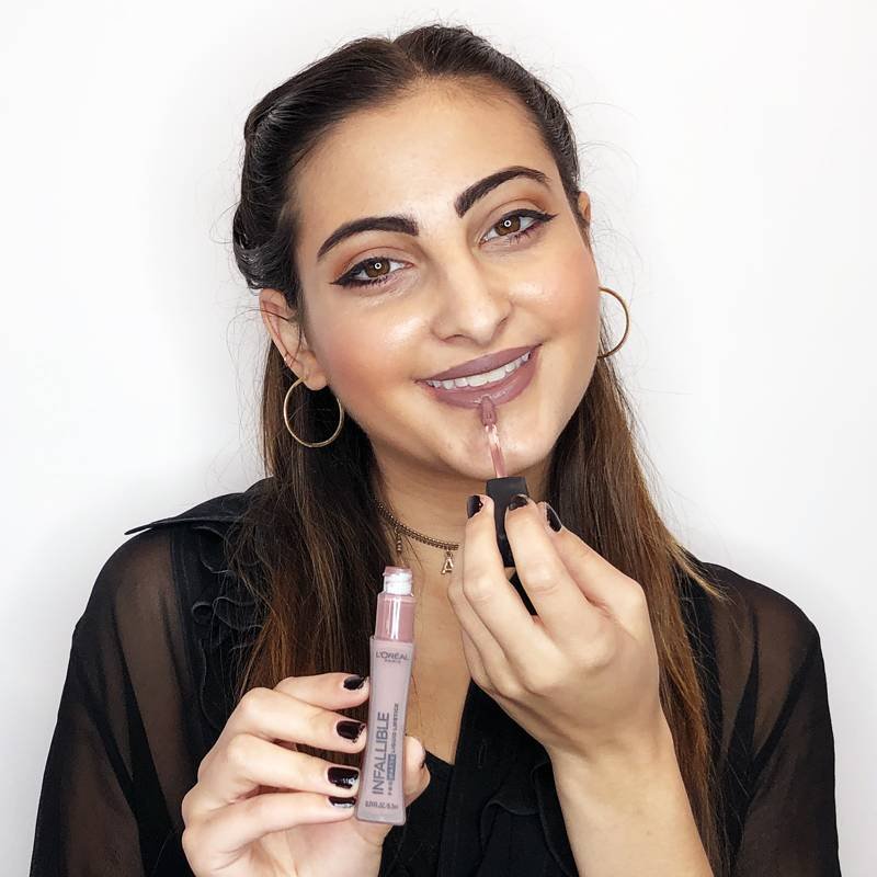 person applying L’Oréal Paris Infallible Pro-Matte Liquid Lipstick