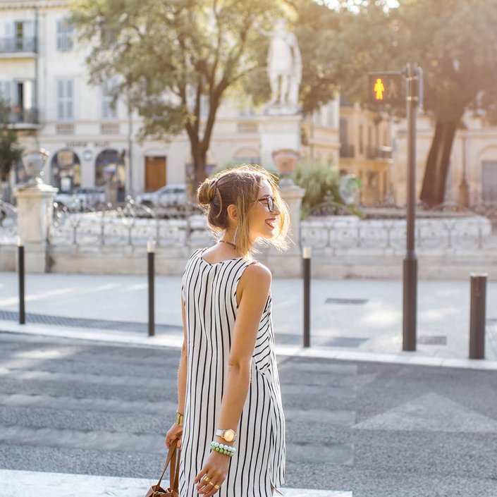 person waiting to cross the street in paris
