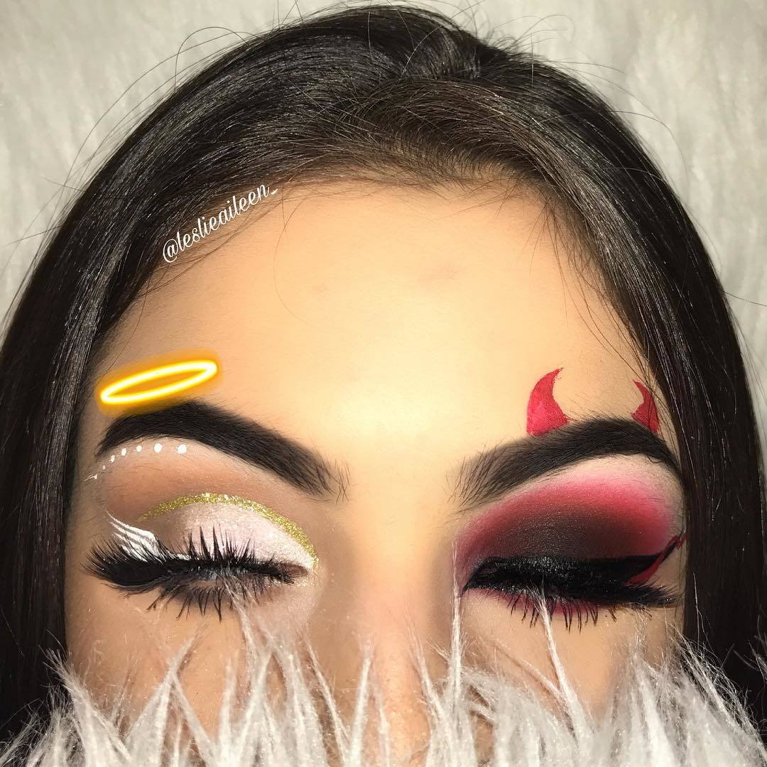 person wearing angel and devil eye makeup