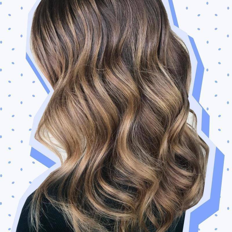 person with highlighted hair curled