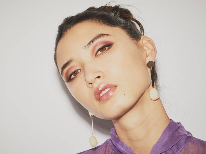 person wearing monochromatic makeup