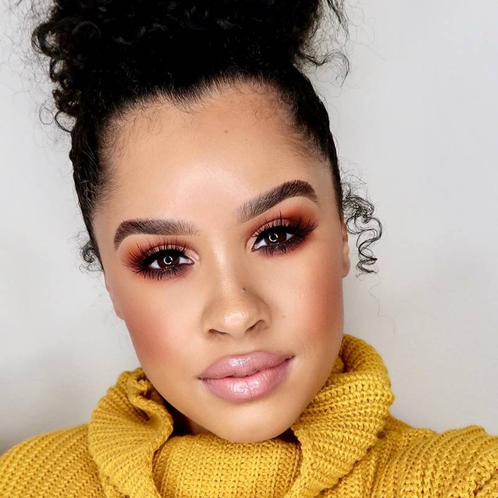 person wearing orange smokey eyeshadow