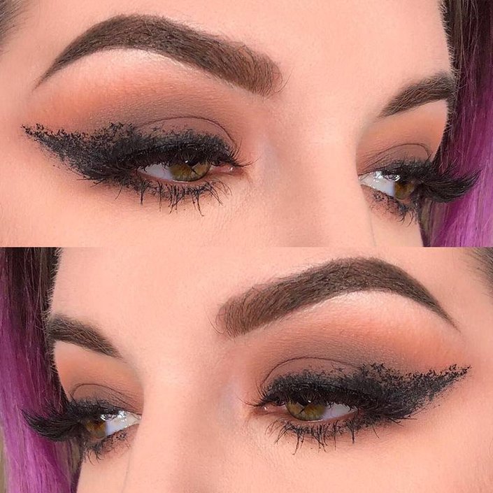 close-up of eyes wearing messy winged eyeliner