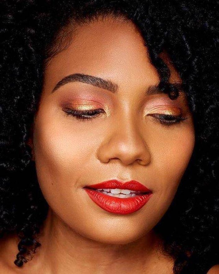 person wearing Maybelline Brow Tint Pen and red lipstick