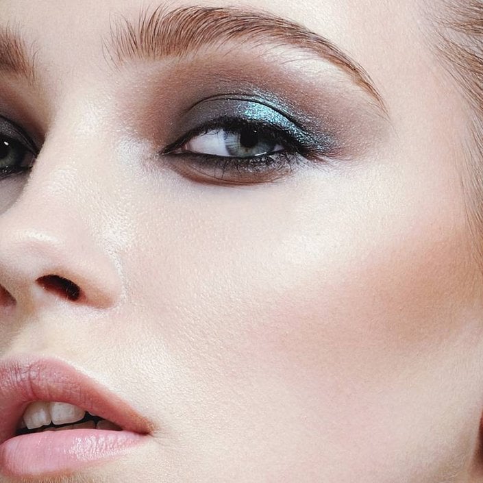 person wearing metallic eyeshadow