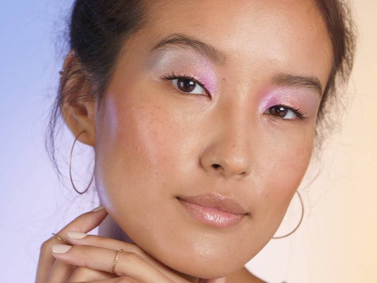 person wearing pastel watercolor eye makeup