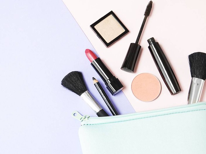 makeup spilling out of makeup bag