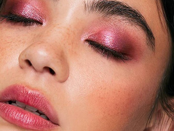 person wearing berry eyeshadow and lip stain