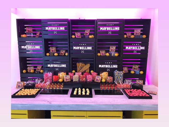 camp maybelline display of makeup and food