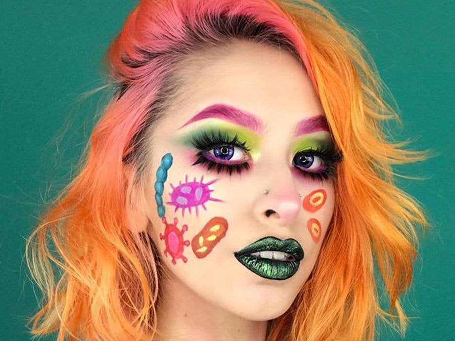person wearing colorful makeup