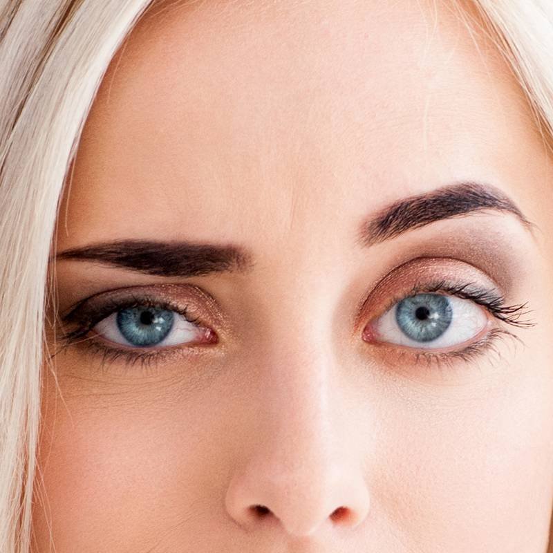 close-up of person's eyebrows, eyes, and nose