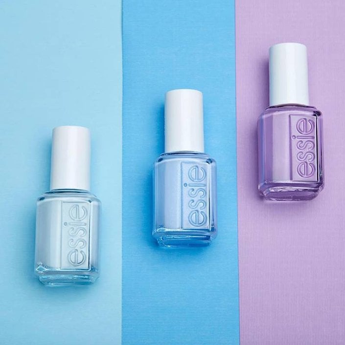 blue and purple essie nail polish bottles