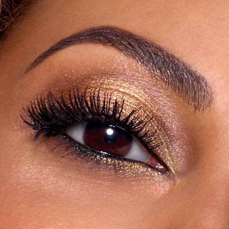 eye wearing metallic gold eyeshadow