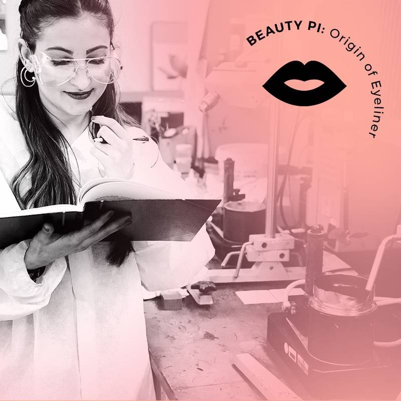 person wearing goggles and reading a notebook in a beauty lab