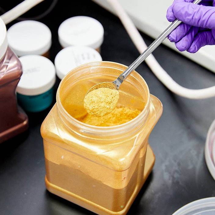 powder makeup in a jar inside a lab