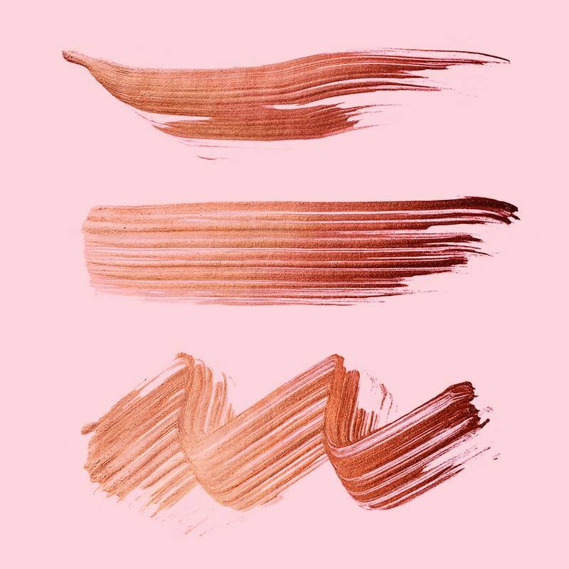 brown foundation swatches on pink background