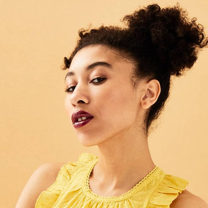 person wearing burgundy lipstick