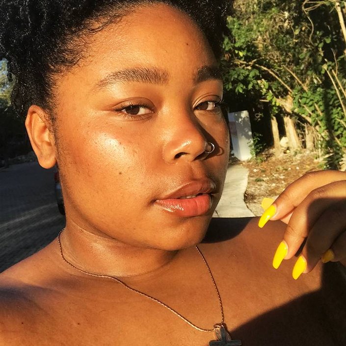 selfie of person's face in sun