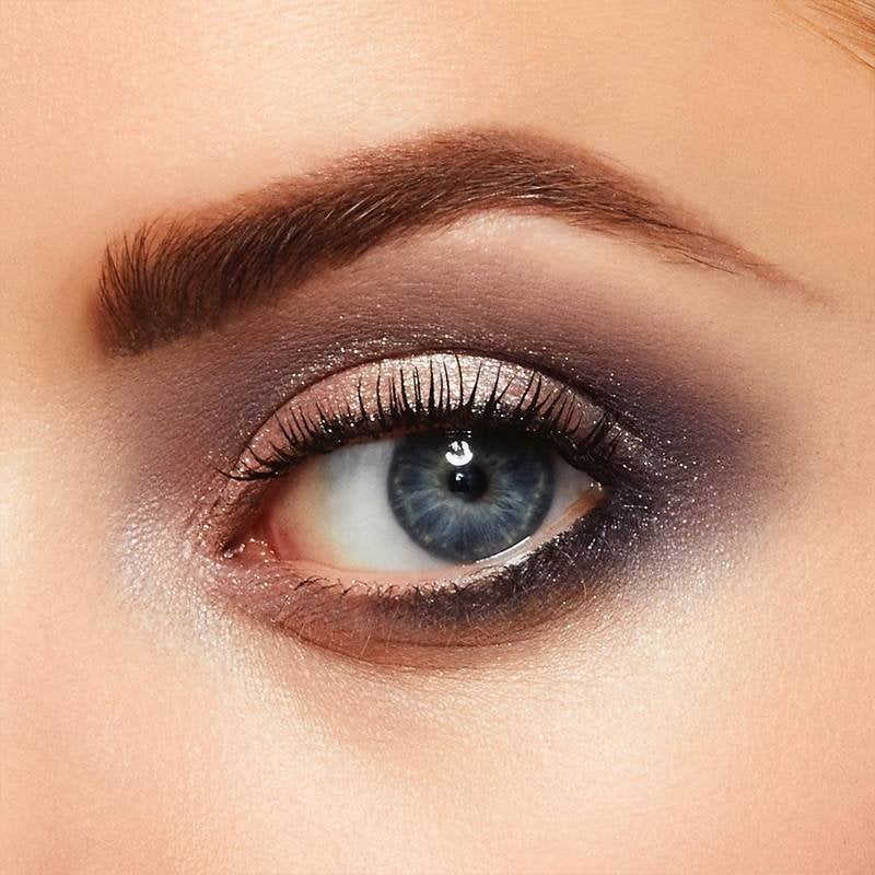 close-up of person's eye wearing smokey eyeshadow