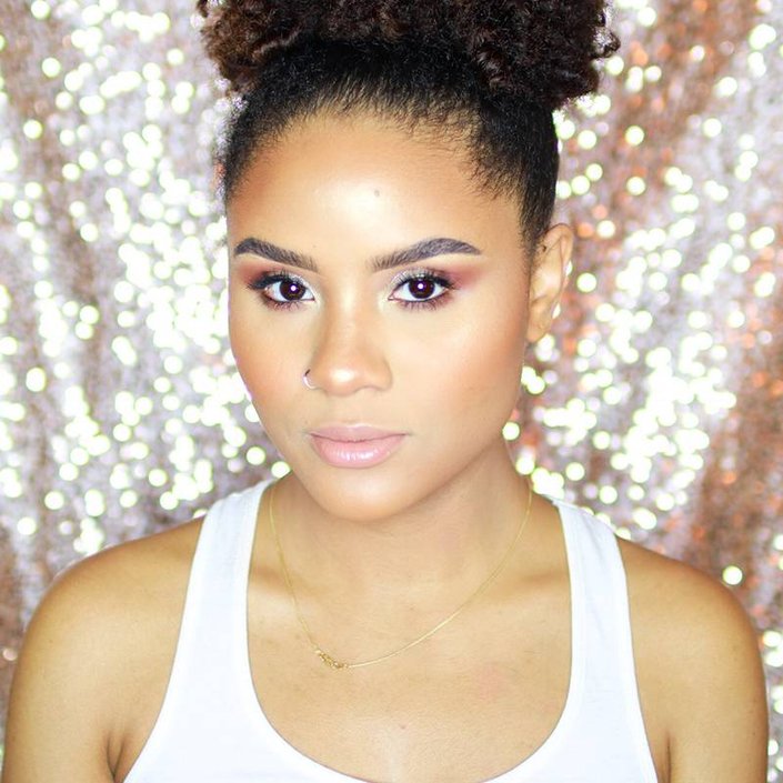 person wearing pink and gold eyeshadow