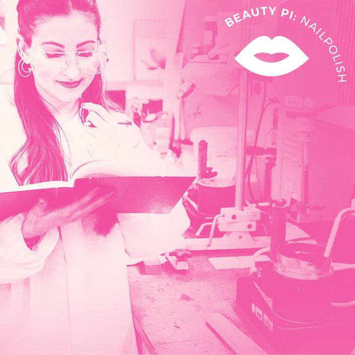person wearing goggles and reading a notebook in a beauty lab