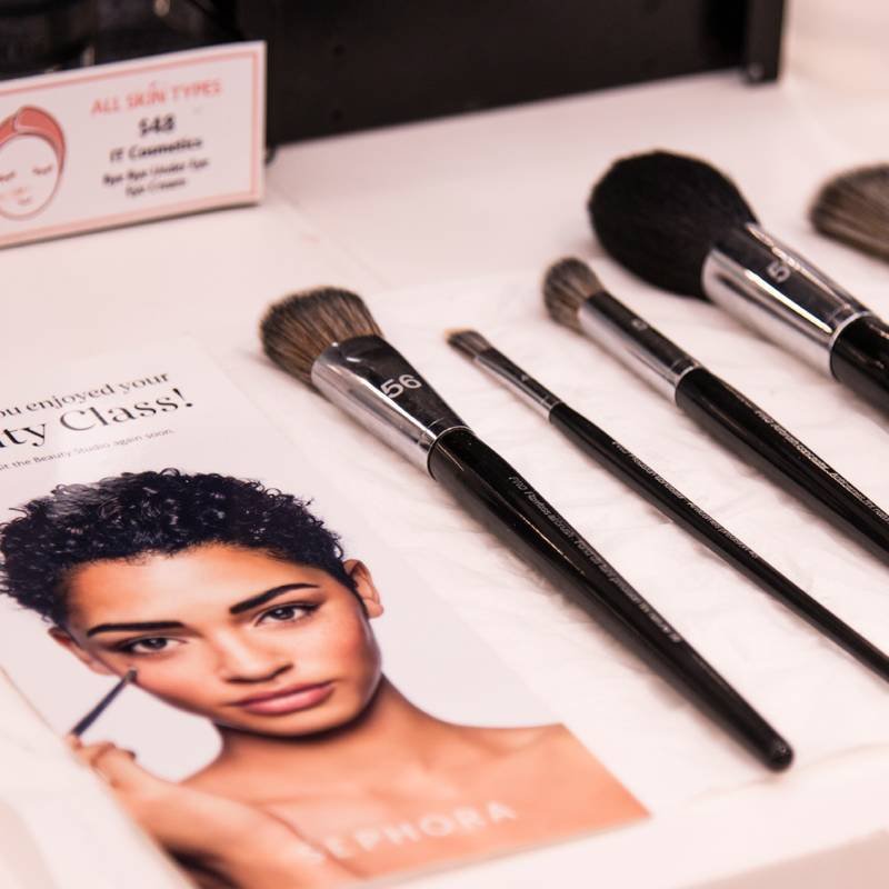 sephora beauty class card on table next to makeup brushes