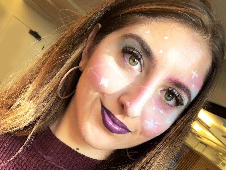 person wearing galaxy halloween makeup