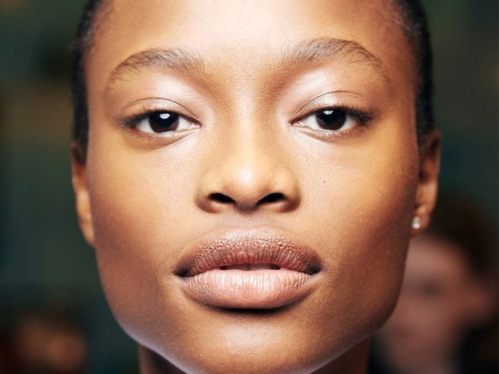 person wearing barely there makeup
