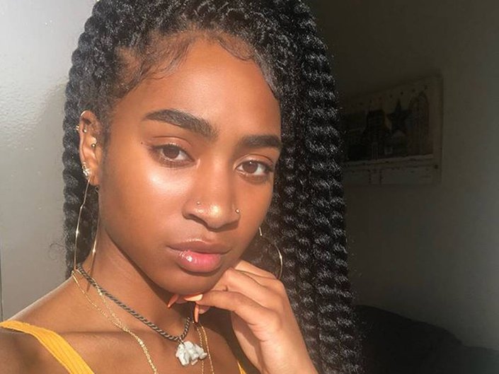 person wearing marley twists hairstyle
