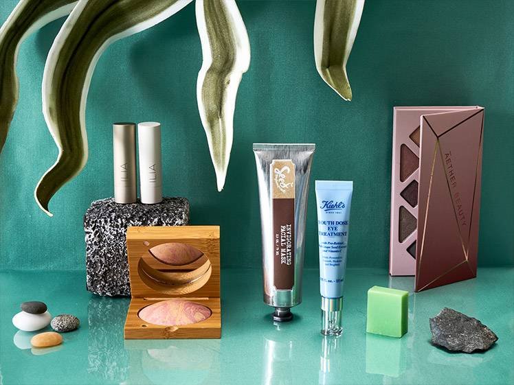beauty products on a green background