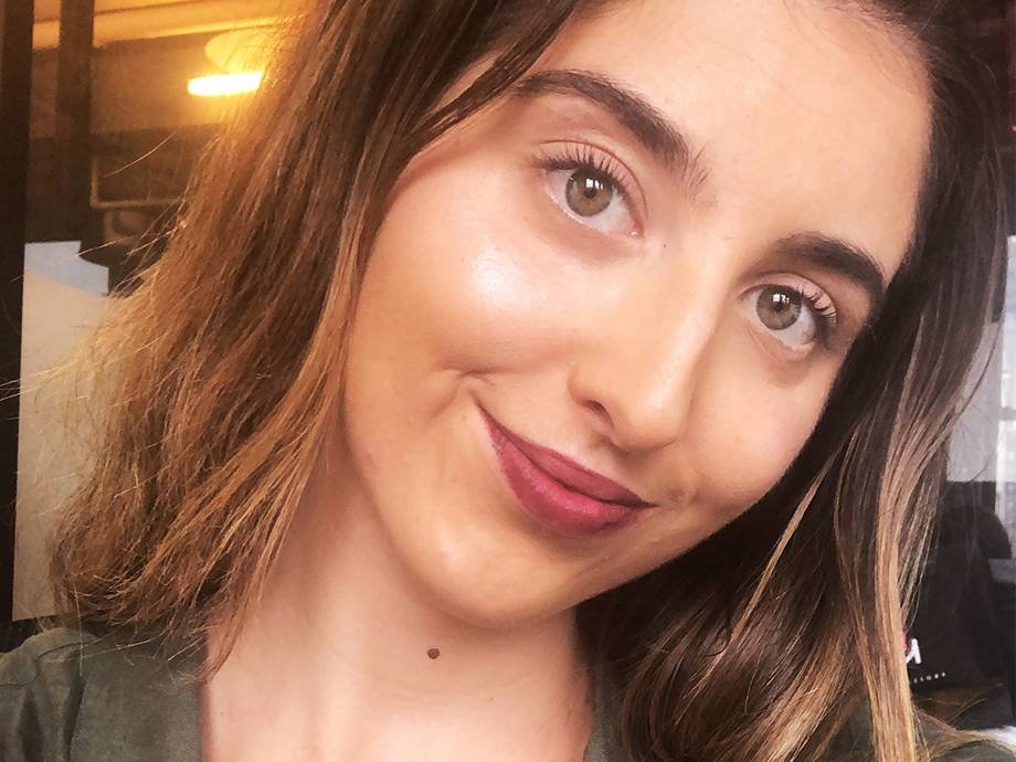 person wearing berry lip stain