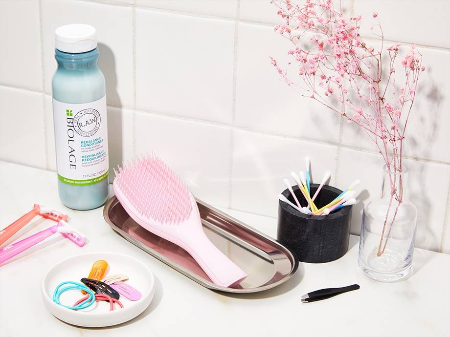 hair products on white countertop