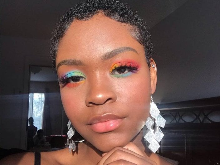 person wearing rainbow eyeshadow