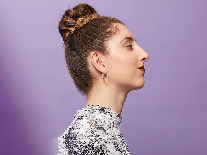 person wearing braided ballerina bun