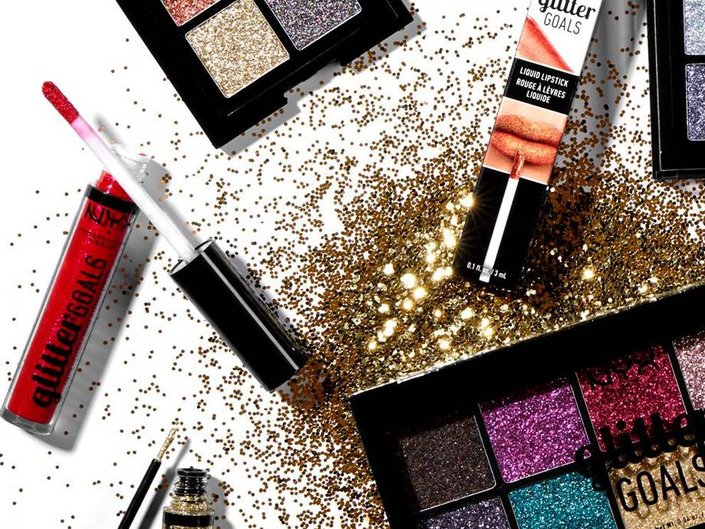 nyx professional makeup glitter products laying in gold glitter