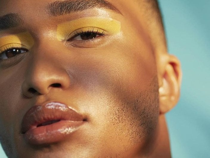 person wearing yellow eyeshadow