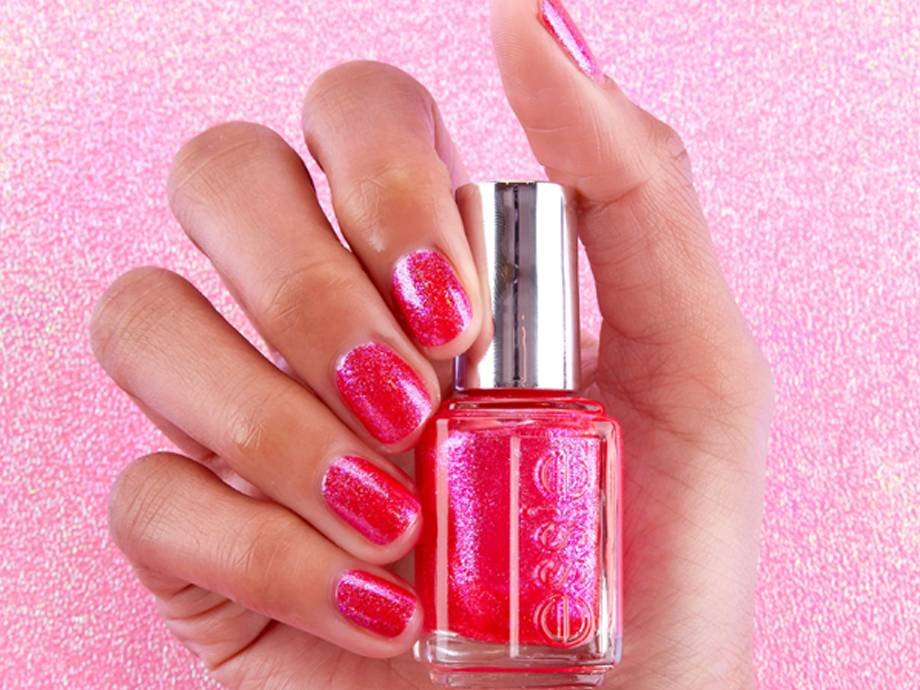 hand holding essie nail polish