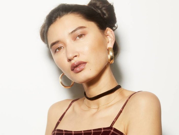 person wearing metallic lipstick