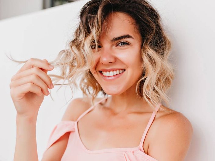 Can a New Hair Color Make You Look More Tan?