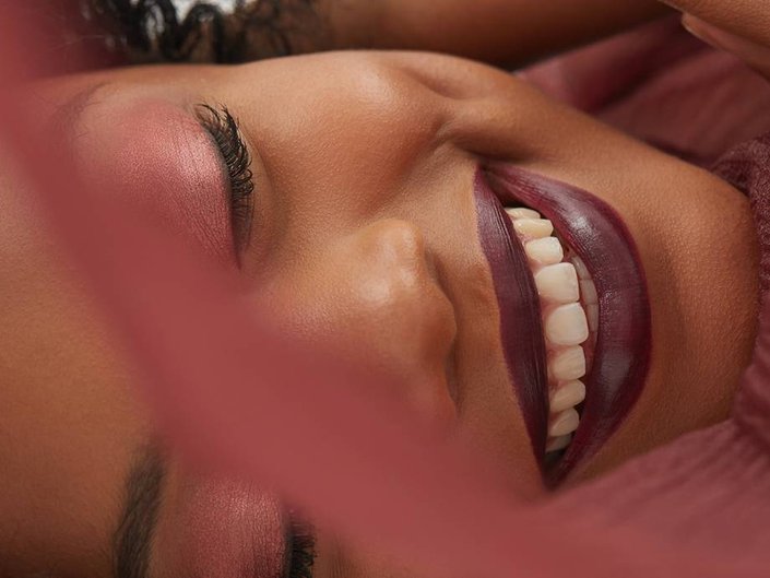 person wearing burgundy lipstick