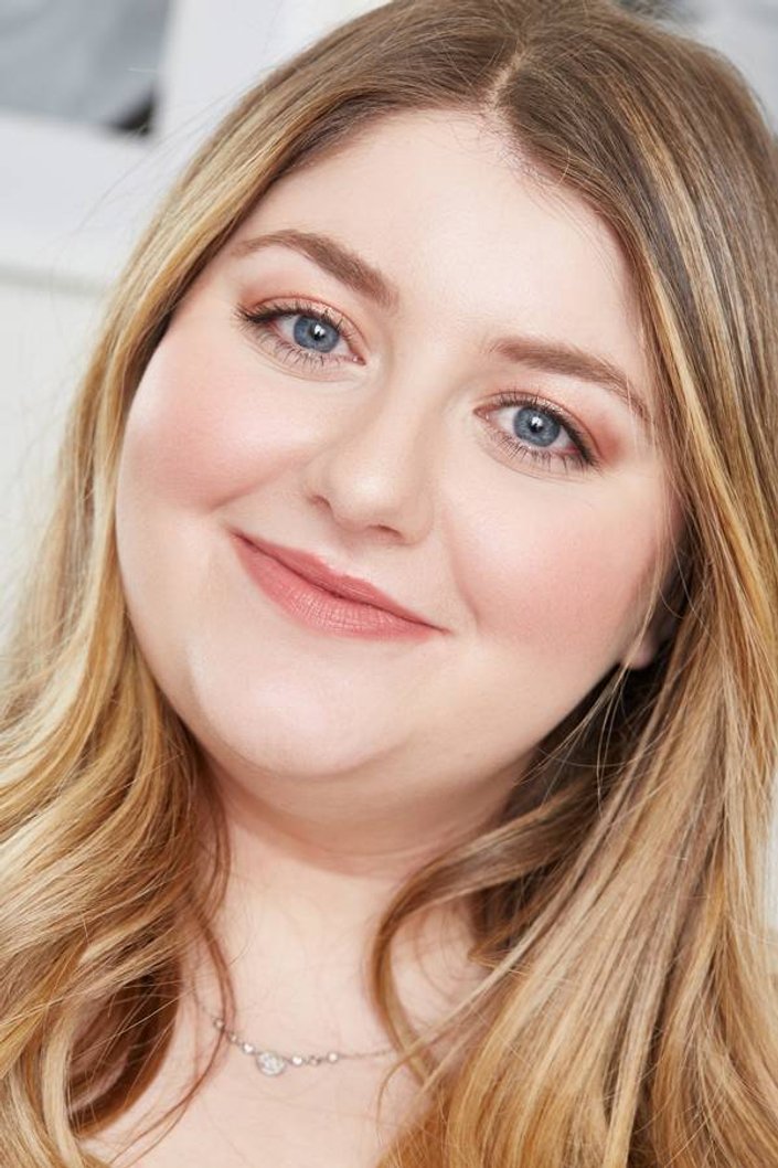 person wearing nude makeup