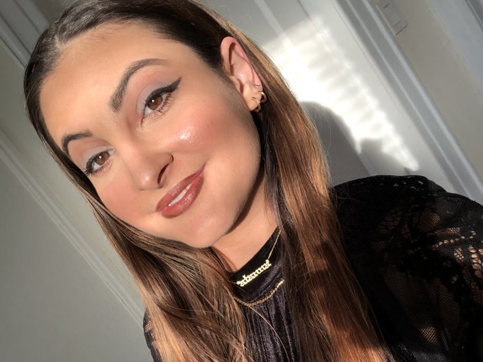 person wearing brown lipstick