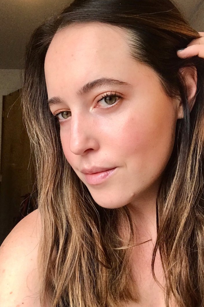 person wearing metallic eye makeup