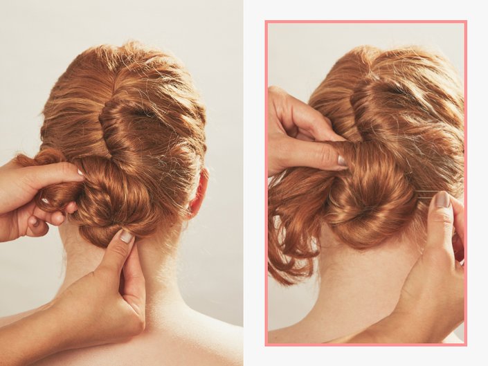person twisting someone's hair into a bun